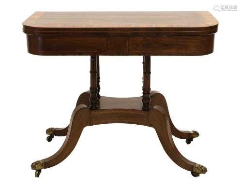 A Regency Rosewood and Crossbanded Foldover Card Table, earl...