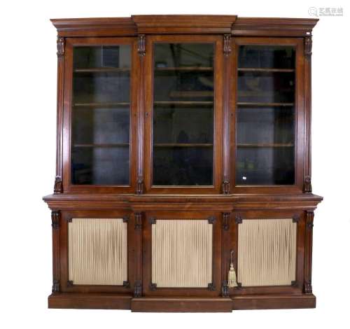 A Regency Rosewood and Mahogany Triple-Door Library Bookcase...