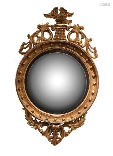 A Regency Carved Giltwood and Gesso Circular Convex Mirror, ...