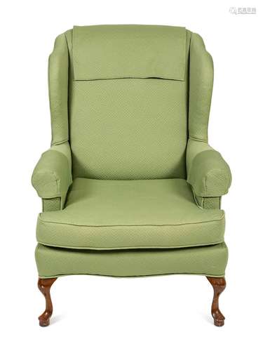 A Queen Anne Style Walnut Wing Armchair