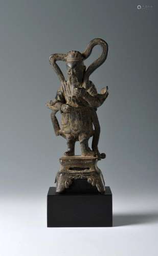 A CHINESE BRONZE FIGURE OF A HEAVENLY GENERAL