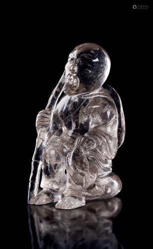 A CHINESE ROCK CRYSTAL CARVING OF A FISHERMAN 清代水晶雕刻渔...