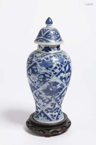 A CHINESE BLUE AND WHITE PORCELAIN 'PLUM BLOSSOM' VASE WITH ...