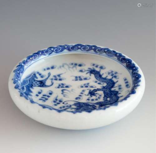 A CHINESE BLUE AND WHITE 'FISH AND DRAGON' BRUSH WASHER 青花...