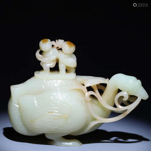 In the Qing Dynasty, Hetian Yubao held a lotus water cup wit...