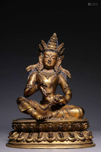 In the Qing Dynasty, the bronze gilded statue of the King Ko...