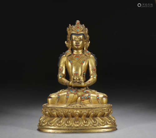In the Ming Dynasty, the bronze gilded statue of the Infinit...