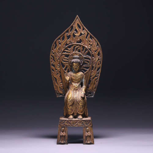 Bronze gilded bench Buddha statue in the Northern Wei Dynast...