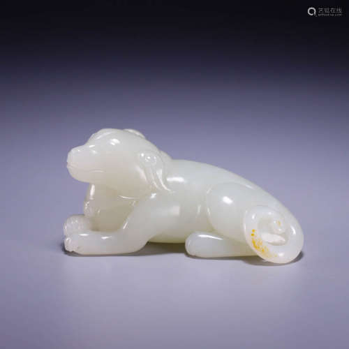 In the Qing Dynasty, Hotan Jade sleeping dog handle