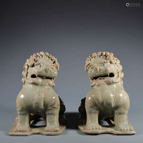 In ancient China, a pair of lions sat on the azure glaze of ...