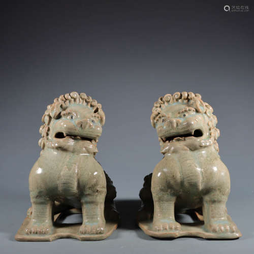 In ancient China, a pair of lions sat on the azure glaze of ...