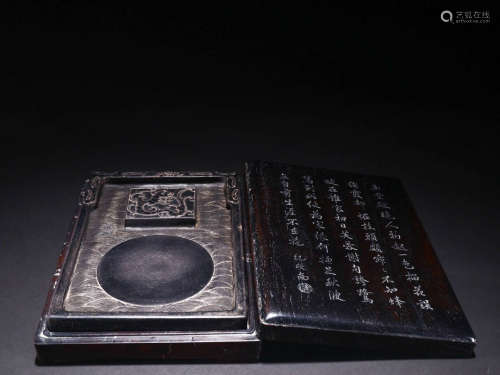 In the Qing Dynasty, the stone dragon inkstone with wooden b...