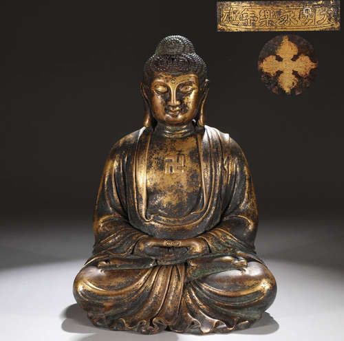 In the Ming Dynasty, the bronze gilded statue of Amitabha Bu...