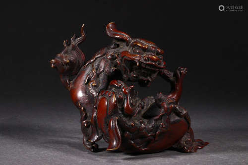 In the Qing Dynasty, rosewood carving with two lions ornamen...