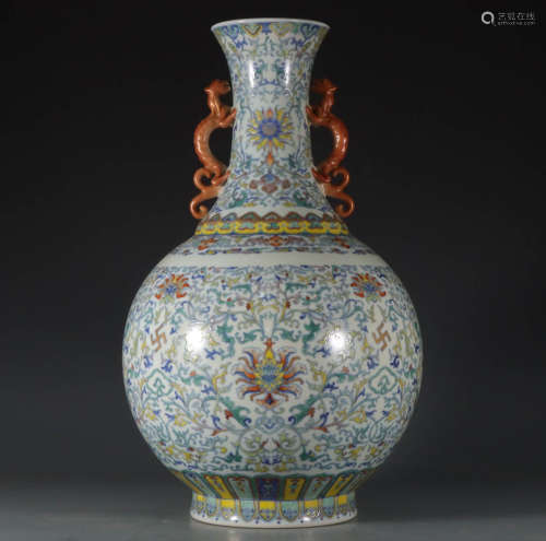 In the Qing Dynasty, blue and white vases with dragon ears w...