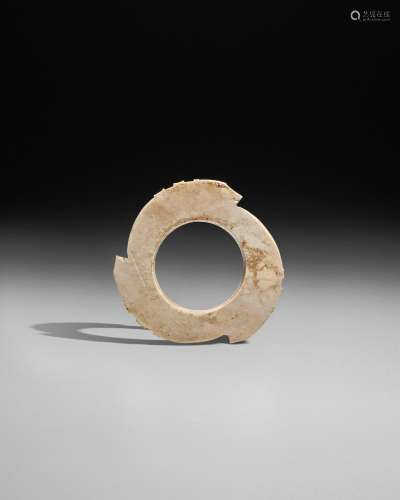 A JADE NOTCHED DISC, YABI Late Neolithic period - early Shan...