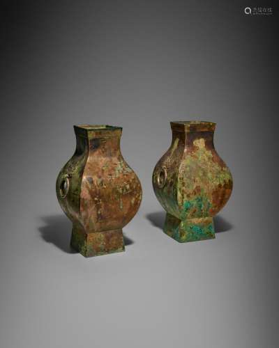 A PAIR OF ARCHAIC BRONZE SQUARE WINE VESSELS, FANG HU Han dy...