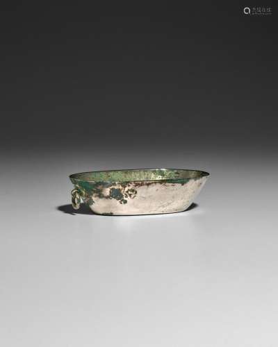A SMALL OVAL SILVER CUP WITH RING HANDLE Tang dynasty