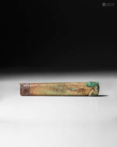 A DRAGON-CARVED JADE DAGGER HANDLE Tang - Five Dynasties
