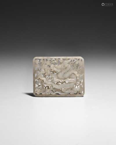 AN OPENWORK WHITE JADE DRAGON PLAQUE Early Ming dynasty, 15t...