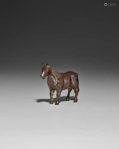A CAST SILVER MINIATURE FIGURE OF A HORSE Qing dynasty