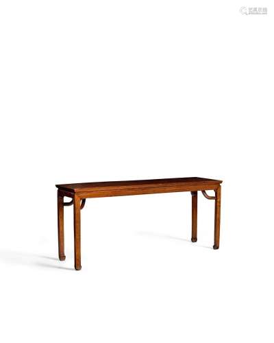 【W】A LARGE HUANGHUALI WAISTED CORNER-LEG TABLE WITH GIANT AR...