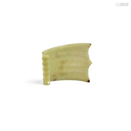 A RARE NEOLITHIC PALE GREEN JADE CURVED AND RIBBED ORNAMENT ...