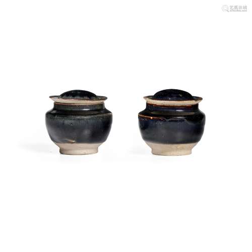 A PAIR OF SMALL HENAN BLACK-GLAZED LIDDED JARS Song/Jin dyna...