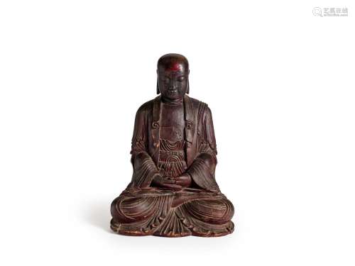 A CARVED AND LACQUERED WOOD SEATED FIGURE OF BUDDHA 17th cen...