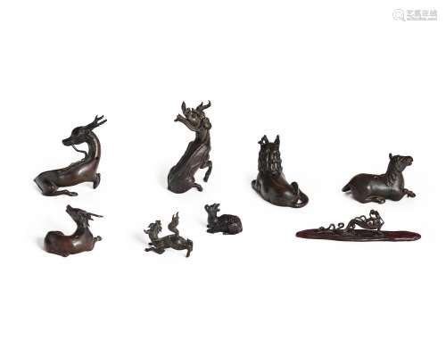 A GROUP OF EIGHT MINIATURE BRONZE ANIMALS AS WATER DROPPERS ...