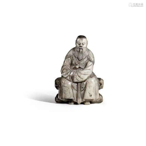A MOTTLED GREY JADE FIGURE OF A SEATED SAGE 17th century