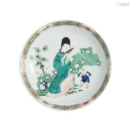 A LARGE FAMILLE VERTE 'LADY PLAYING A SHENG' DEEP SAUCER DIS...