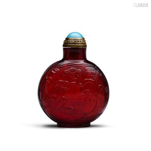 A CARVED RUBY-RED 'LONGEVITY SYMBOLS' SNUFF BOTTLE  Possibly...
