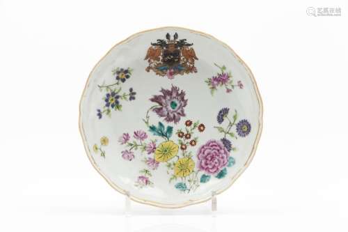 A deep scalloped armorial plate