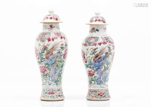 A pair of vases and covers