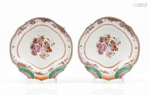 A pair of scalloped deep saucers