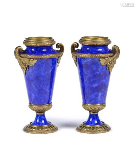 A pair of Louis XVI style urns