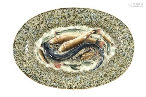 A decorative serving platter with fish