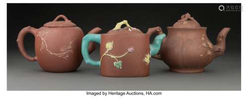 A Group of Three Chinese Yixing Teapots Marks: (various) 5-1...