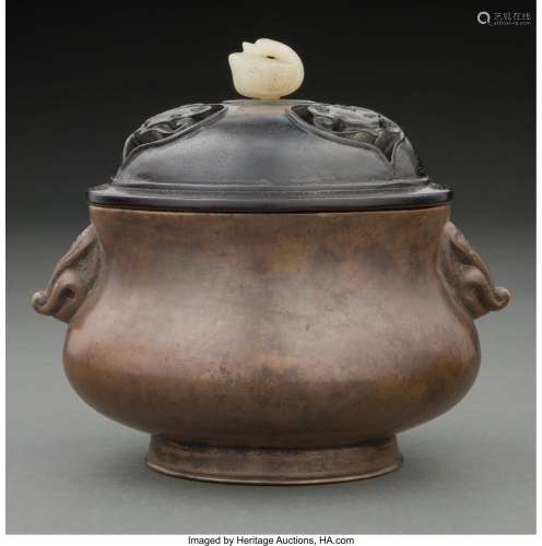 A Chinese Bronze Covered Censer with Jade Finial Marks: six-...