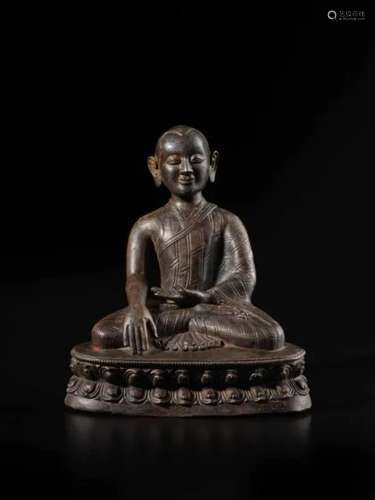 Tibet，17th century A large copper alloy figure of a lama