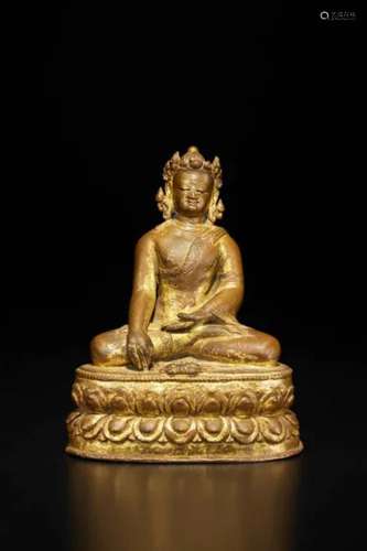 Tibet，14th/15th century A gilt-copper alloy figure of Buddha