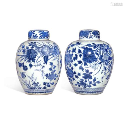 A pair of blue and white 'bird and flower' ovoid jars and co...