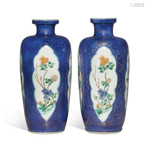 A pair of powder-blue-ground famille-verte rouleau vases, Qi...