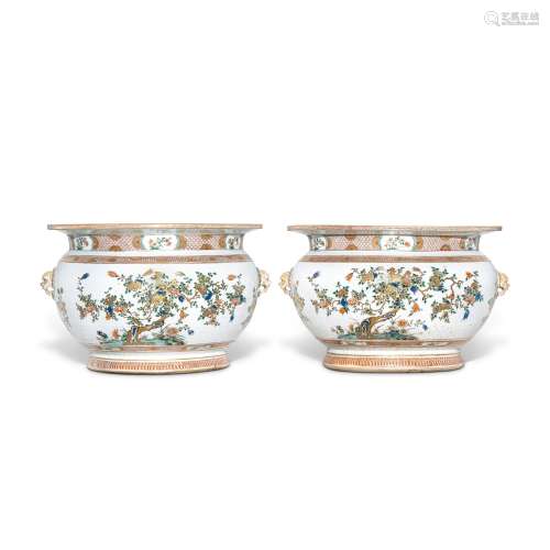 A rare and large pair of famille-verte 'floral' fish bowls, ...