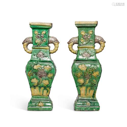 A pair of famille-verte biscuit square-section baluster vase...