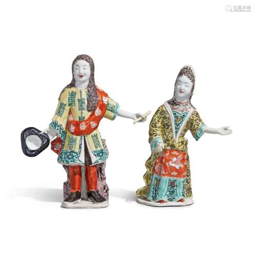 A rare pair of famille-verte figures of a European lady and ...