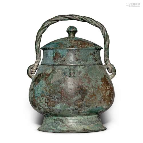 An important inscribed archaic bronze ritual wine vessel (Yo...