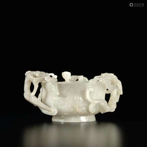 An openwork pale celadon jade 'chilong' cup, 17th / 18th cen...