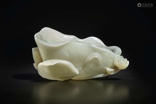 A white jade lotus leaf-form washer, Qing dynasty, 18th cent...